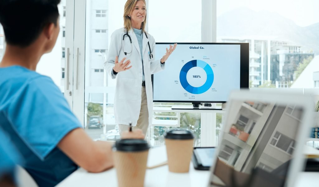 Shot of a mature female doctor doing a presentation in a meeting at a hospital.